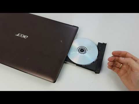 Wideo: Jak Włożyć Płytę Do Laptopa