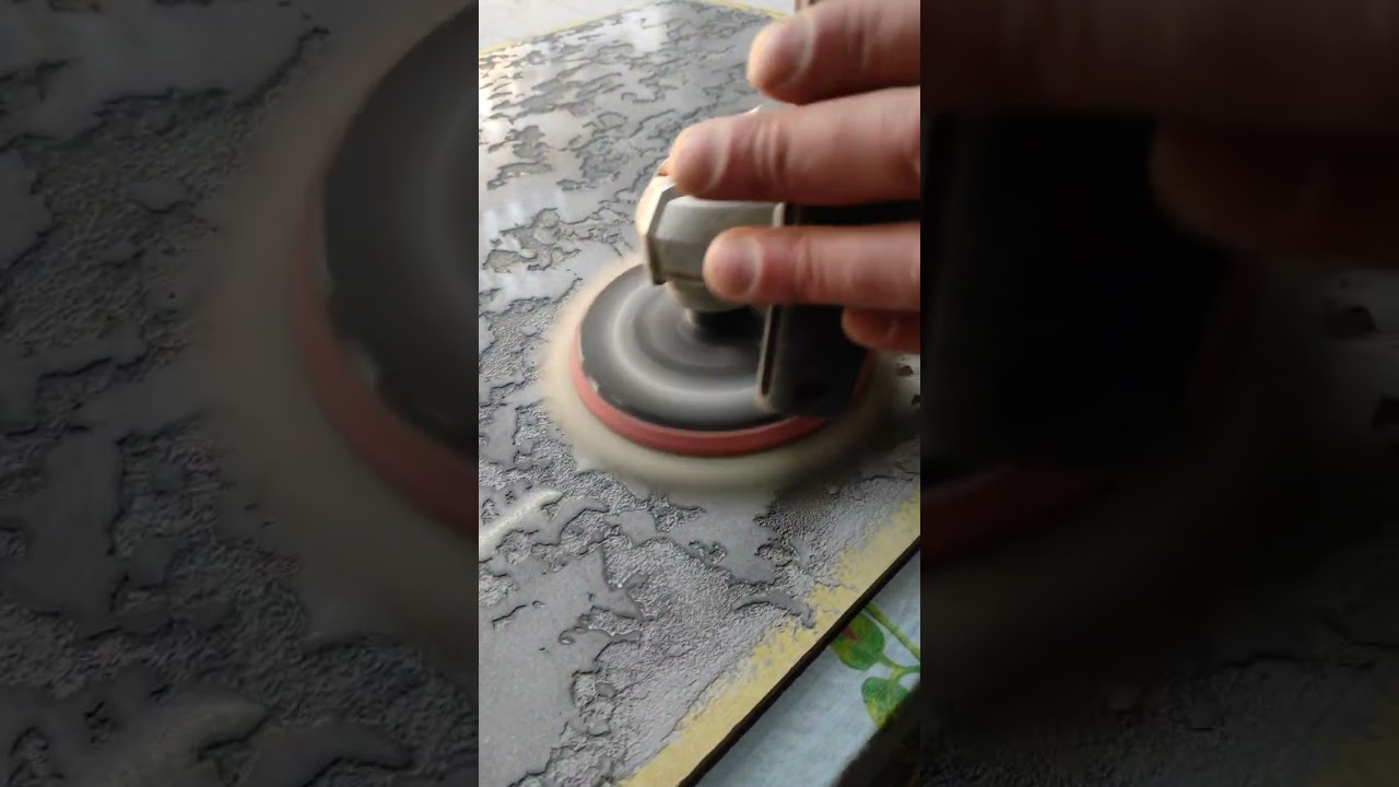 Classic world map-themed decor, done in shades of gray. 