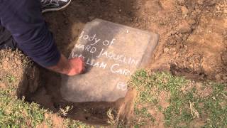 Halloween surprise: tombstone fragment found buried in churchyard