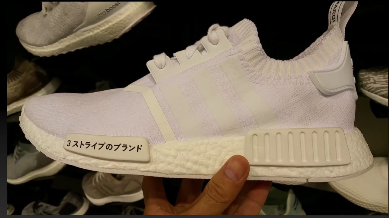 black nmd with writing