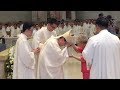 Cardinal Tagle's parents at offertory on son's 60th birthday