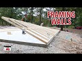 Framing raising  leveling walls on our diy shop building kits