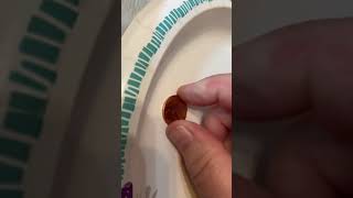 SOAPY WATER ON A PENNY