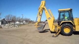 start up procedures of the 710d Jonh deere backhoe.