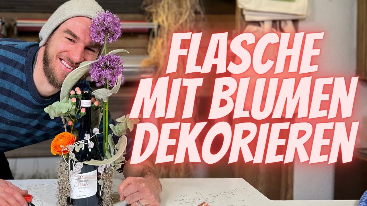 Flasche mit Blumen dekorieren - Geschenk Idee zum selber machen für einen Besuch