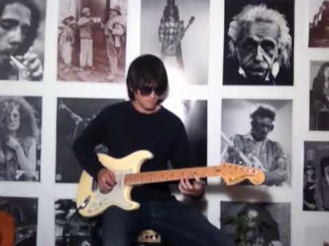 Playing guitar on LSD