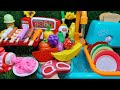 Diy mini food cookingwith cut fruits and vegetables for colorful dish using playdoh and kitchen set