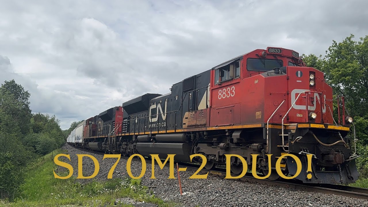 SD70M-2 Duo) CN M303 North With 8833 And 8802 At McCowan Road Near