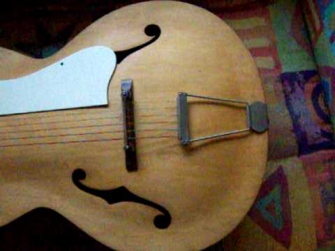 need help identifying archtop guitar. f-hole. kay,...