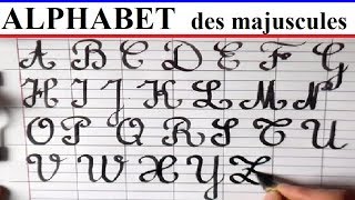 écriture de l'alphabet avec des pleins et les déliés sur feuille Seyès 