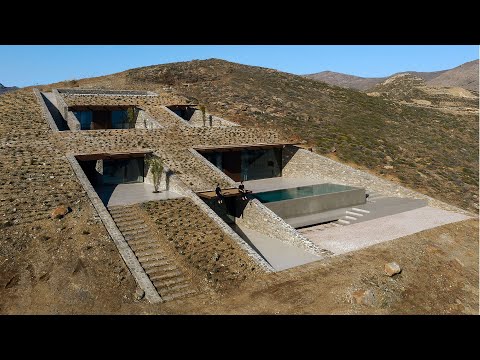 Vidéo: Amazing Camouflaged Stone House en Grèce