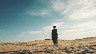 Woman Walks Alone  In Desert Stock Video