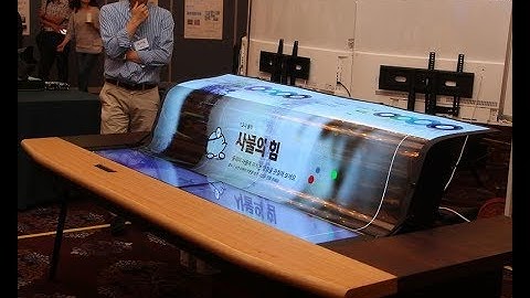 LG Unveils Stunning 77″ 4K UHD Flexible And Transparent OLED Display