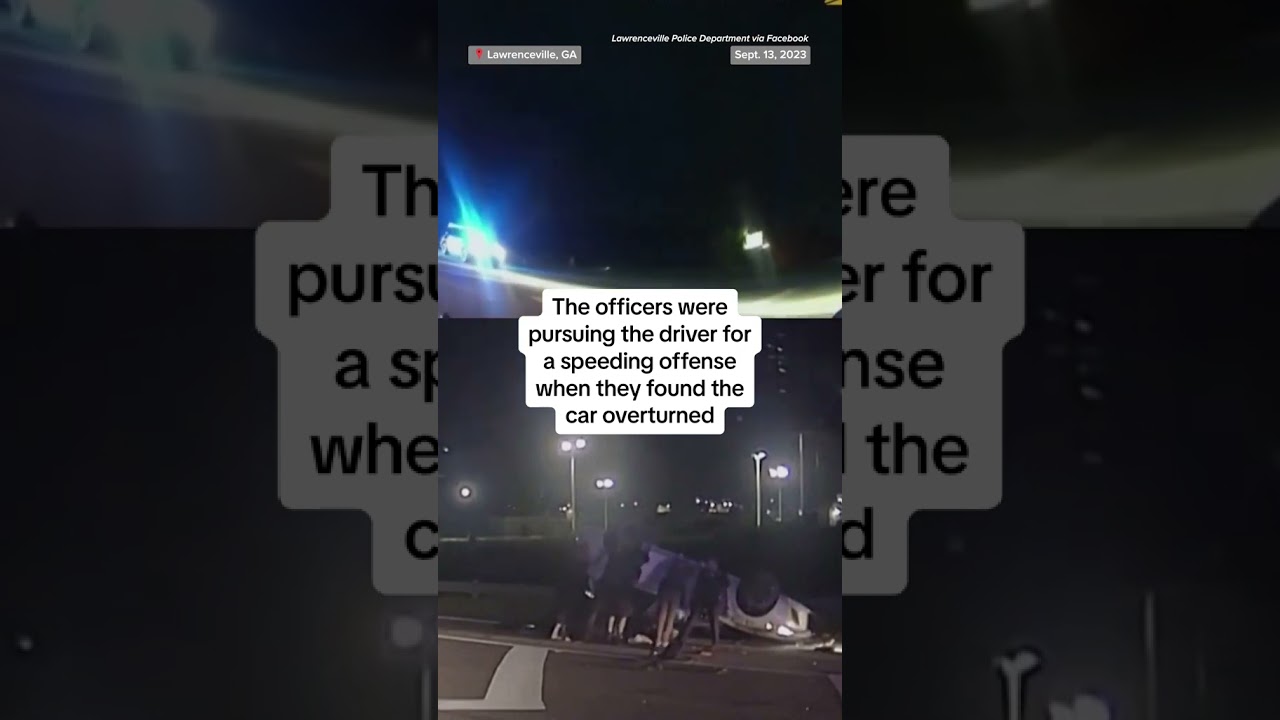 Officers lift flipped car to rescue trapped driver