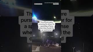 Officers lift flipped car to rescue trapped driver
