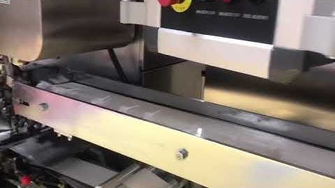 Ball lollipop double twist wrap machine