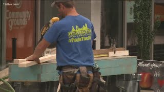 Community helps neighborhood's only grocery store reopen after damage by vandal