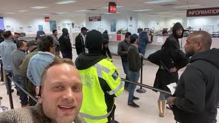 Waiting at the DMV in a Long Line During the Coronavirus with a Group of People