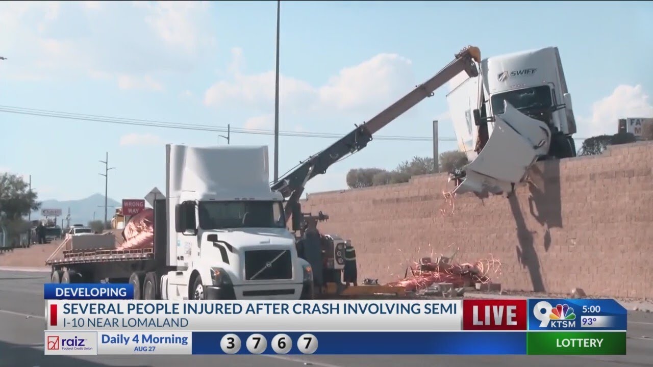 Semitrailer hangs off I-10 after crash - YouTube