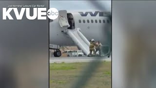 Passengers evacuated after airplane skids during landing in the Caribbean