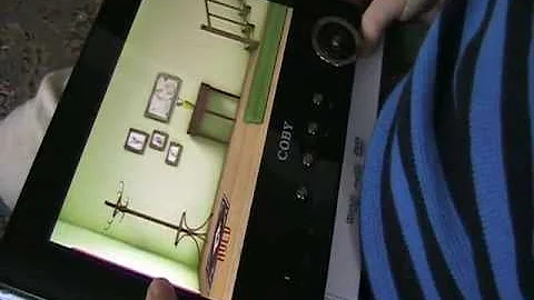 Coby TFDVD7052 7-Inch Portable Tablet DVD/CD/MP3 Player