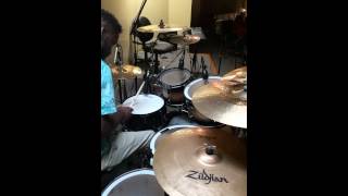 Joseph Buggs testing out his friend drum kit!