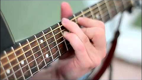 Vibrating guitar strings making music