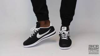 nike cortez ultra black white