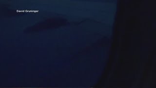 Video shows flames shooting from engine of a United Airlines flight