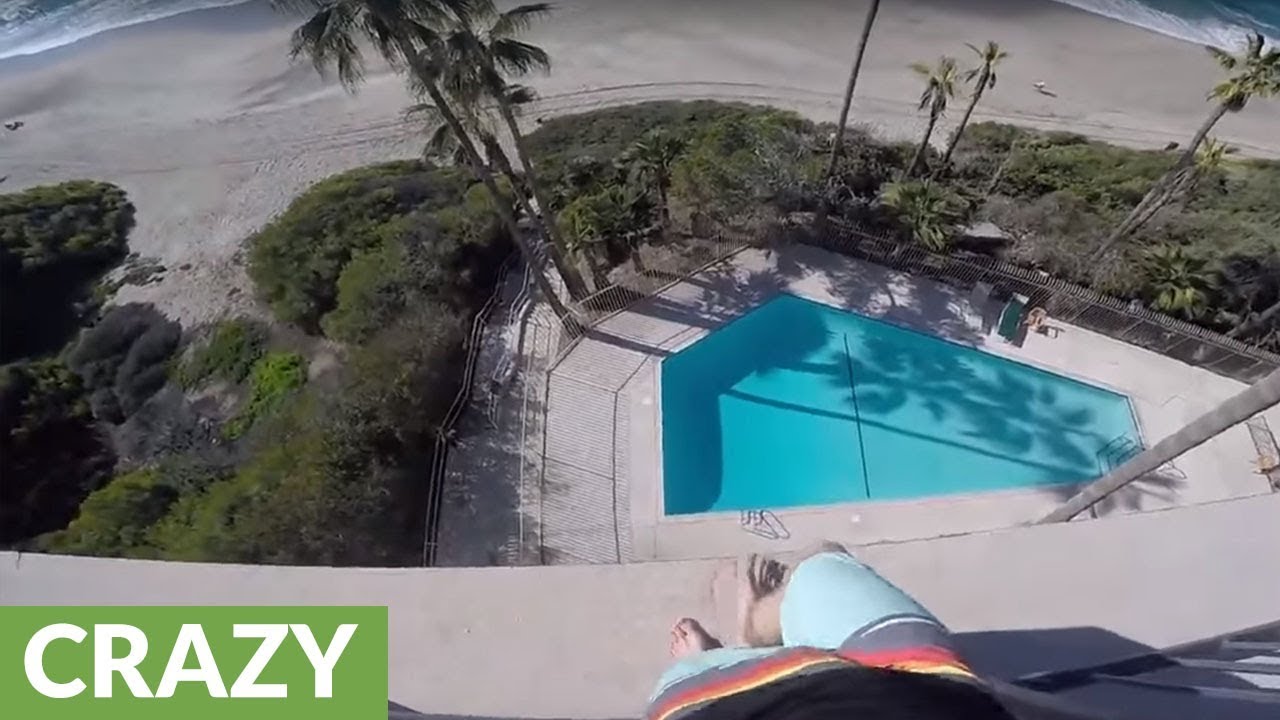 Crazy kid jumps off 6 story balcony into pool