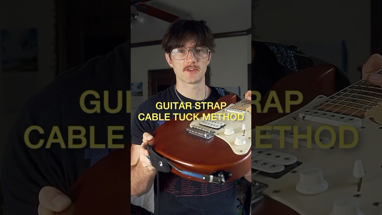 The guitar strap cable tuck… 