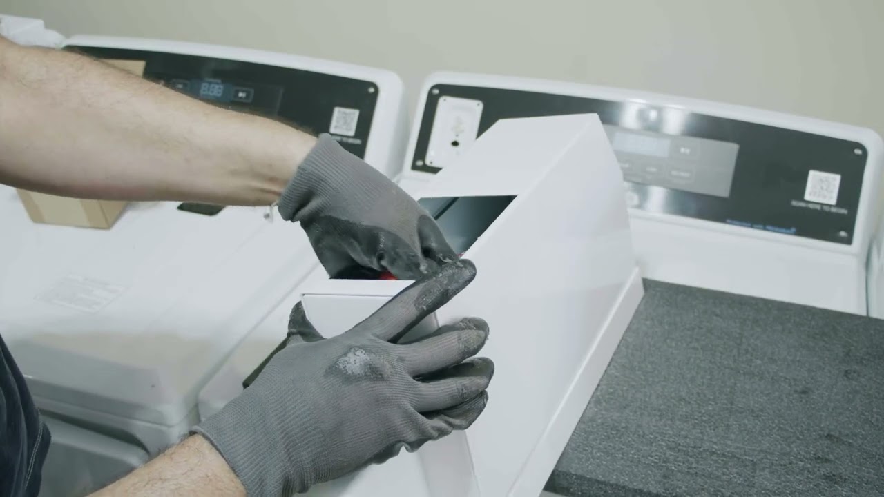 Installation Instructions for the Coin Kit Accessories on the VTW565  Washer/VTD56 Dryer