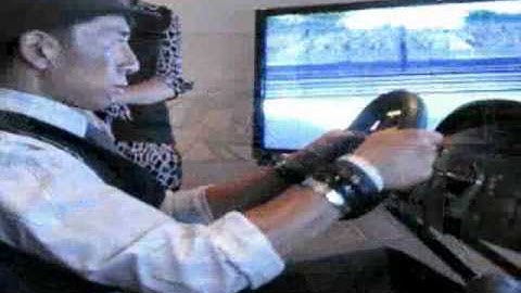 Stars Try Out the Motion Pro II Racing Simulator