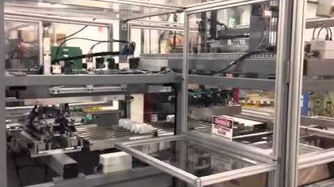 Caps stacking and packaging machine