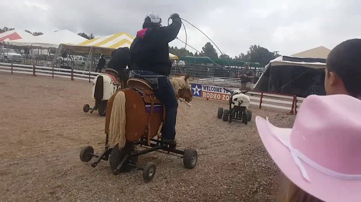 Skipp and Tina riding mechanical horse