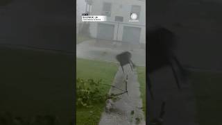 Chairs, Trees Fly By Louisiana Home During Storm