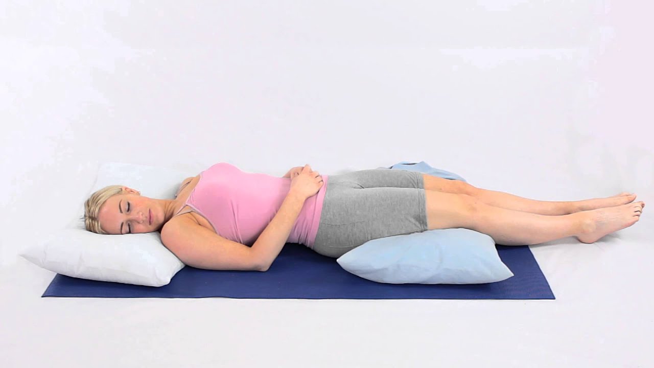 How to sleep on your back with back pain - YouTube