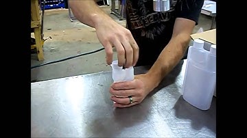 Handheld Chuck Capper on Bedex Bottles - APACKS