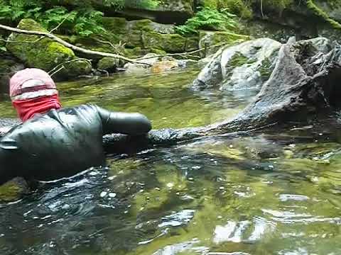 210 wet lx: Black Latex Catsuit in the Creek