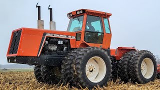 Allis Chalmers 4w-305 and Sunflower chisel plow working corn ground in the snow