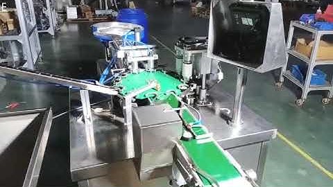 Cap assembly machine