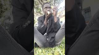 Eating an Orange on a fine Sunday Evening at Kaiboi, Africa