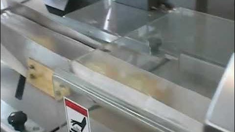 Delfin flow wrapper packaging bread  in a paper poly film