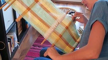 Plain weave demonstration on a backstrap loom