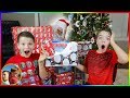 Boys vs Girls NERF BATTLE! Boy's Try to Open Christmas Presents Early!