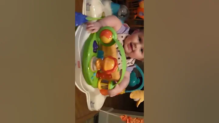 Cora Anne Buckner 3/29/12 jumping in her bouncer =-)