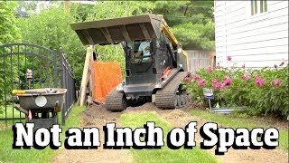 Grading a Back yard with an ASV Tracked skid steer