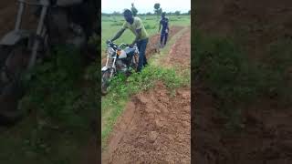 Improvising a motor cycle as a plough.
