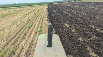 John Deere 720 diesel and John Deere R plowing wheat stubble