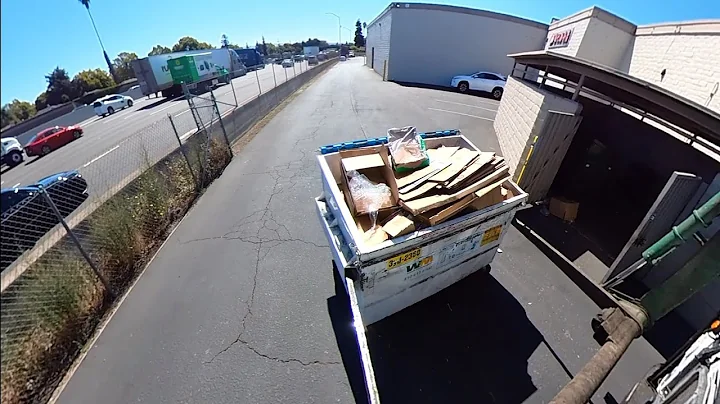 Waste Management front load commercial garbage truck 